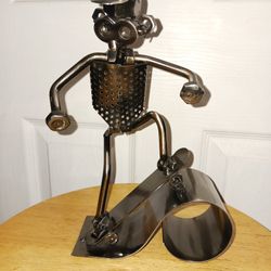 Metal Skater Robot Sculpture.