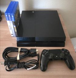 PlayStation 4 console with games