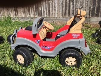 Kids four wheeler battery operated used needs battery