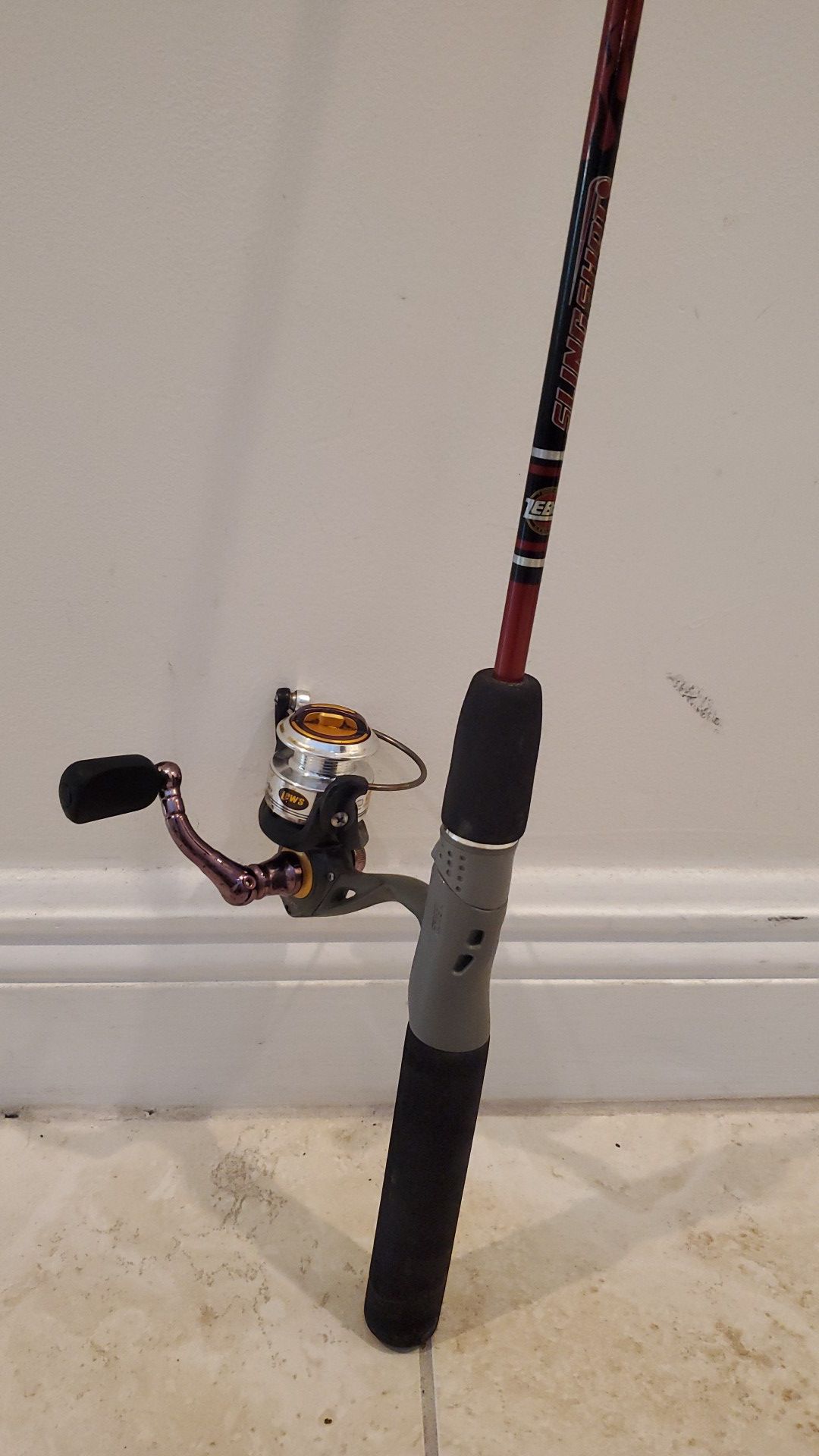 Light Zebco fishing rod and Lews reel combo with Shakespeare Tackle box