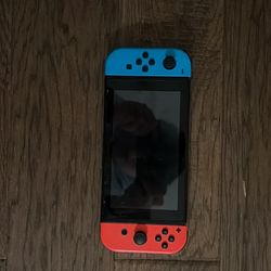 Nintendo Switch Red And Blue Controllers And Black 