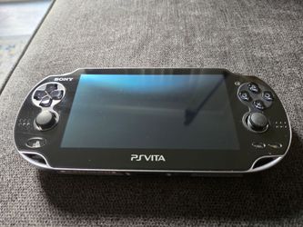 Sony Playstation Vita Model PCH-1001 Excellent Condition! Plus 8 Games With A Case, Memory Card, And Carrying Case!