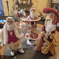 Three vintage santa claus figurines