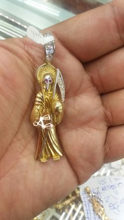 14k Gold santa muerte cz 15.1 gramos