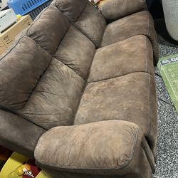 Reclining Sofa – Comfortable – Works Great  Description: Comfortable 3-seat reclining sofa. Recliners work well and couch is very solid. Shows normal 