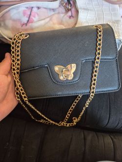 Black and gold purse