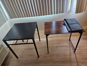 2 tables (black  & brown)