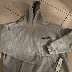 essentials hoodie size M