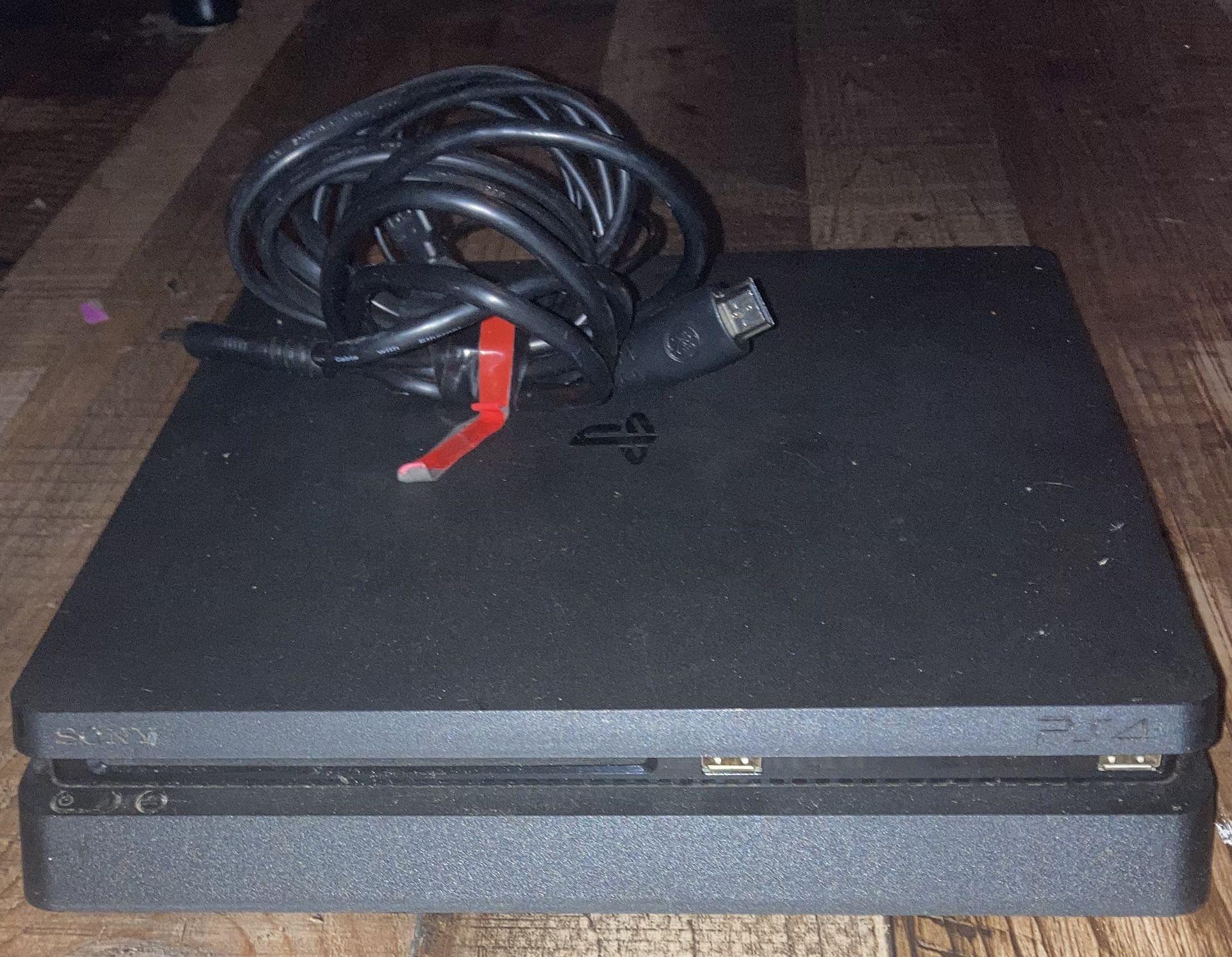 PS4-slim In Great shape also Has The Power Wire And HDMI Cable Buy Needs Controllers