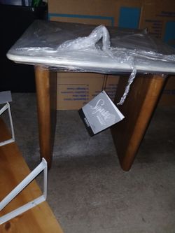 Marble slab table with wood legs