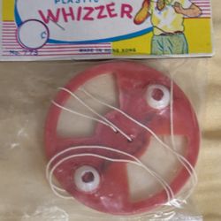Whistling plastic whizzer
