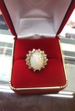 Diamond ring with natural opal