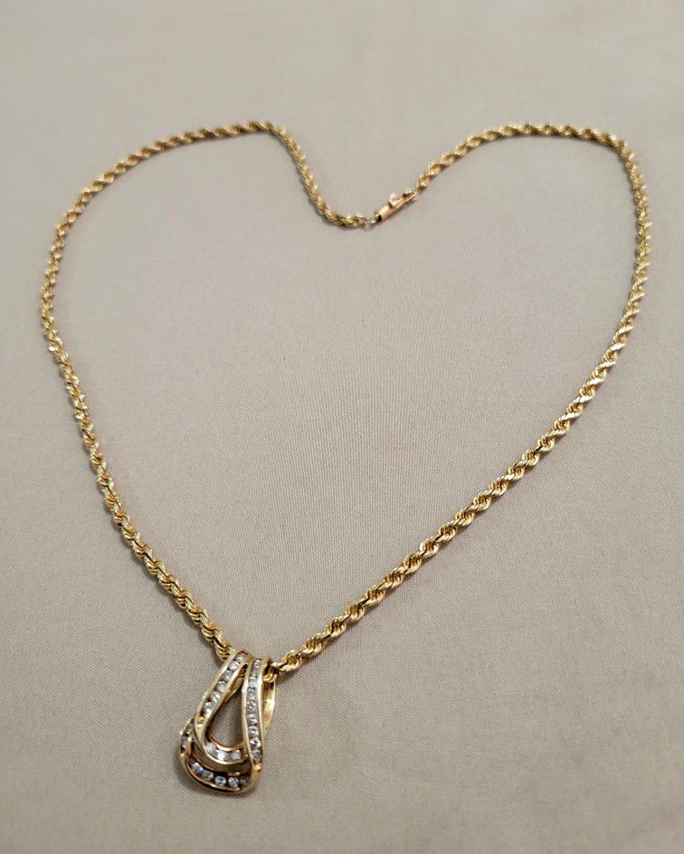 14K Solid Gold  Rope Chain And Diamonds Pendant.  Good Condition. 