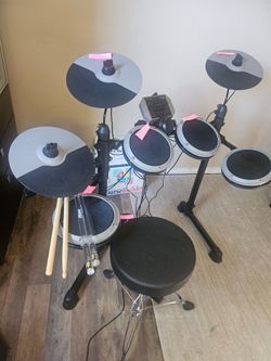 Drum set, chair, headphones, 2x drumsticks