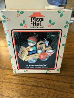 Rare 1993 Pizza Hut "Christmas-To-Go" ornament made by Enesco. The collectible ornament features an elf in a vehicle made of pizza boxes, complete wit