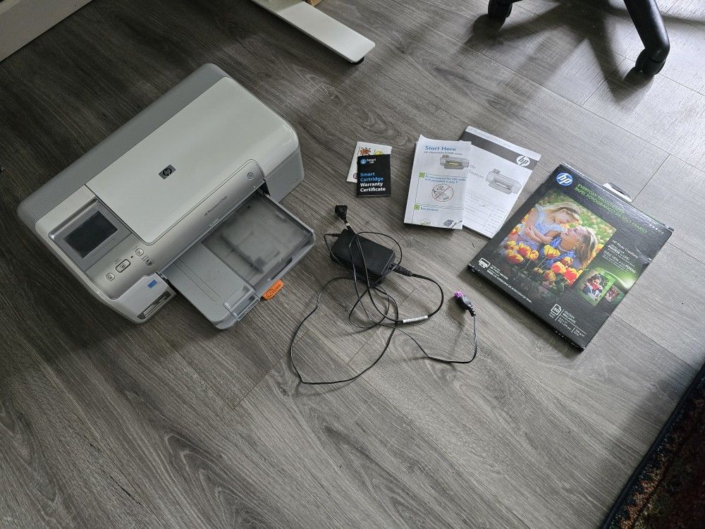 Photo printer with paper