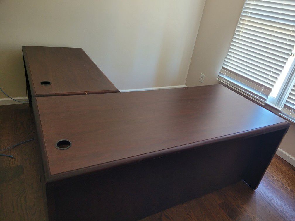 Used L shaped desk with functional drawers. AS IS. You pick up.