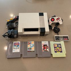 Nintendo nes original with games super Mario contra