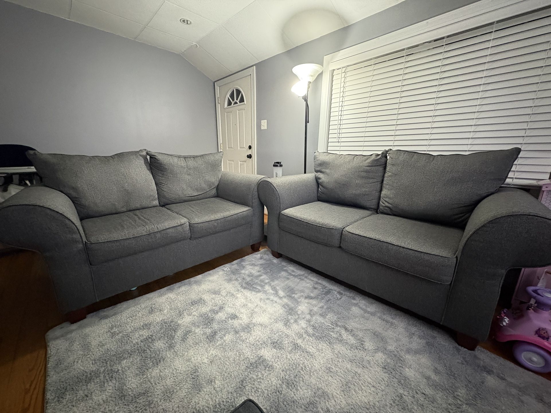 TWO LOVESEAT SOFAS