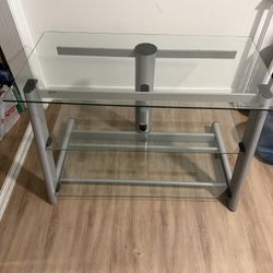 Bell’O glass tv stand