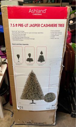 Ashland 7.5 ft. Jasper Cashmere Pre-Lit Artificial Christmas Tree. Features "Quick Set" assembly technology and comes pre-lit with 450 clear lights.