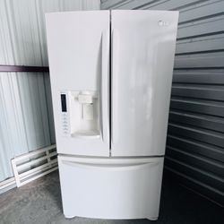 Beautiful 3 Door With Water And Ice In The Up And With The Freezer In The Bottom 