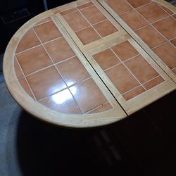 Round pullout out 2 leaf.table