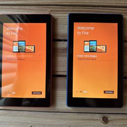 Two Amazon 8 Inch Fire Tablets