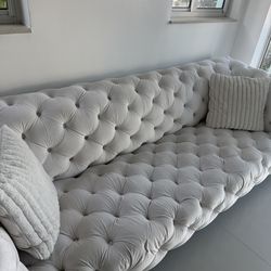 White cream tuffed couch sofa