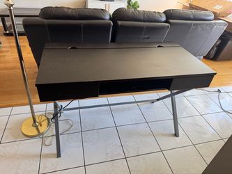 Desk with built in power strip