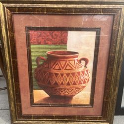 Contemporary framed canvas print of Southwest or tribal-inspired wall art.