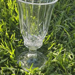 Two piece construction-bigger piece has some defects on the rim, but still a gorgeous piece nonetheless  Elegant crystal glass vase with intricate des