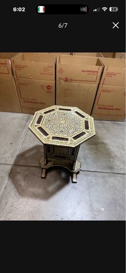 vintage side table made in egypt in very good condition and it’s foldable for easy storage and hand made