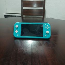 Nintendo Switch Lite Comes With Controller, Case, And Charger Factory Reset Good Condition