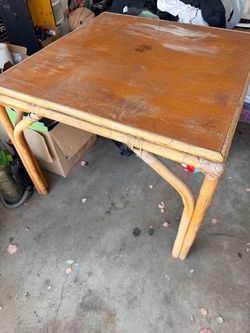 Rattan Base Wood Top Dining Table first come first serve