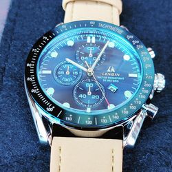 Brand new designer watch leather band just put a brand new battery in it $20