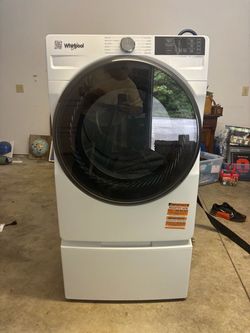Whirlpool Front Load Washer and Dryer Set with stands