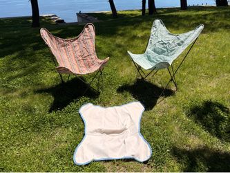 Butterfly chairs with canvas sling seats