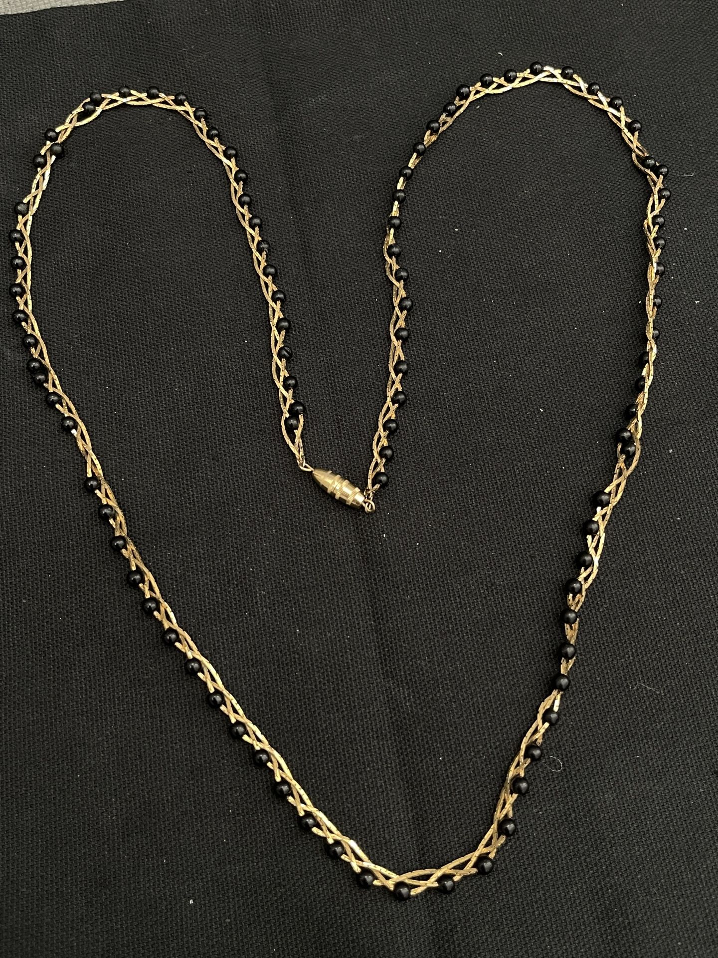 30 In shiny gold links with circular black beads Necklace
