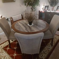 Dining table chairs and rug