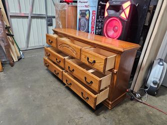 Oak Wood 7-Drawer Dresser with Carved Detail