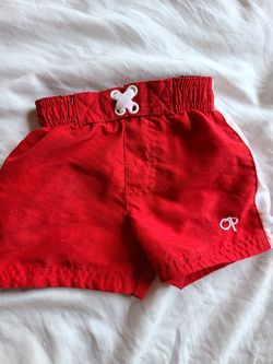 OP swimming shorts 3-6 mos.