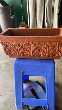 Italian terra-cotta planters with drip tray