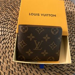 Louis Vuitton wallet / brown