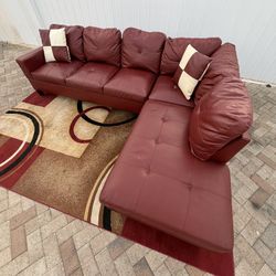 Nice and comfortable 2-piece leather sectional sofa and 2 decorative pillows. Delivery available for an additional cost. Dimensions: 107.5 x 74.5 x 35