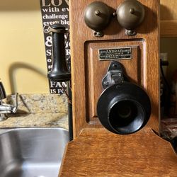 Antique Julius Andrae & Sons Co. oak wood wall telephone. Early 1900s