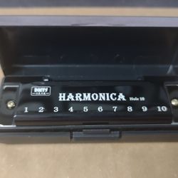 Harmonica New In A Box.