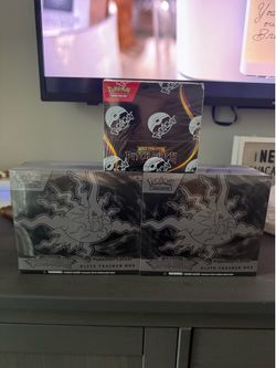 2 pitch black pokemon center ETBs and 1 pitch black booster box