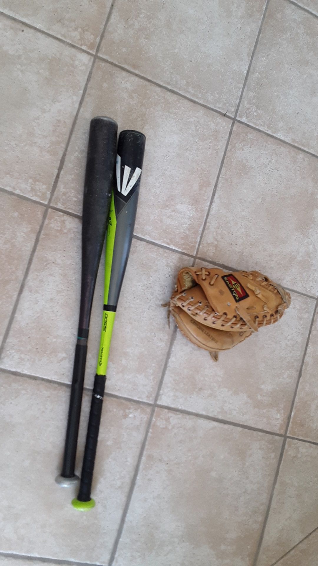 Looking to trade two bats and catchers mitt for youth glove