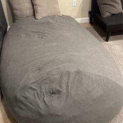 large grey bean bag 